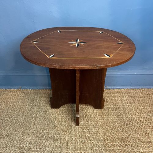 A Bombay Furniture Company Bone and Ebony Inlaid Oval Table . Anglo Indian Circa 1920