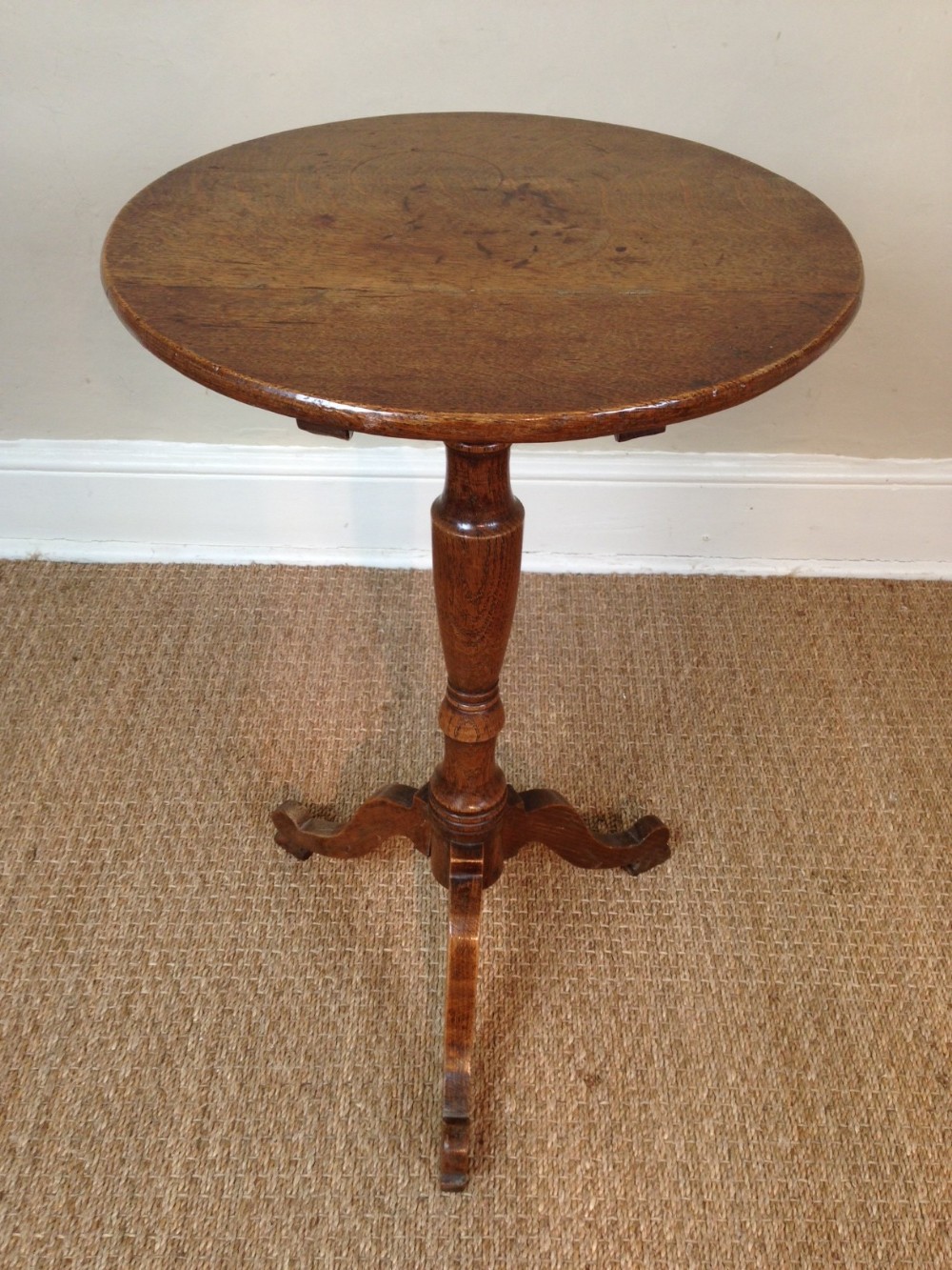 A George 111 oak tripod table c 1820