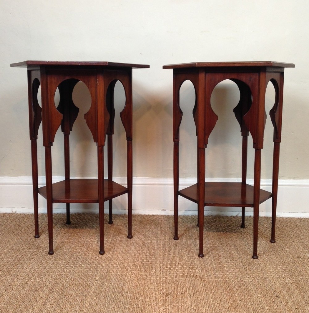 A matched pair of Liberty walnut Moorish tables c 1890
