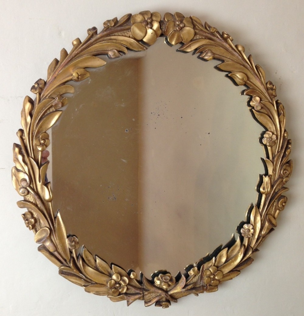 A William IV carved gilt circular mirror c 1835