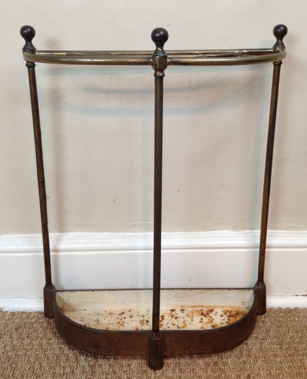 A Victorian brass and iron stick stand c 1890