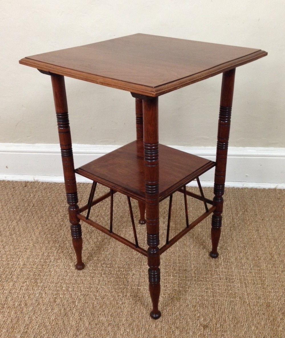An Aesthetic Movement walnut table designed by E W Godwin c 1880