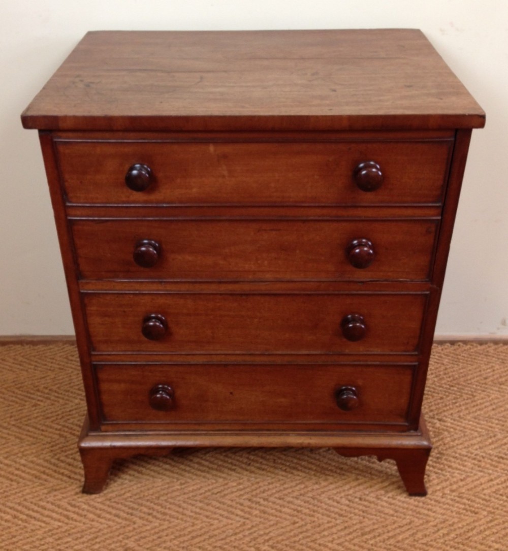 A late George 111 mahogany commode chest c 1800