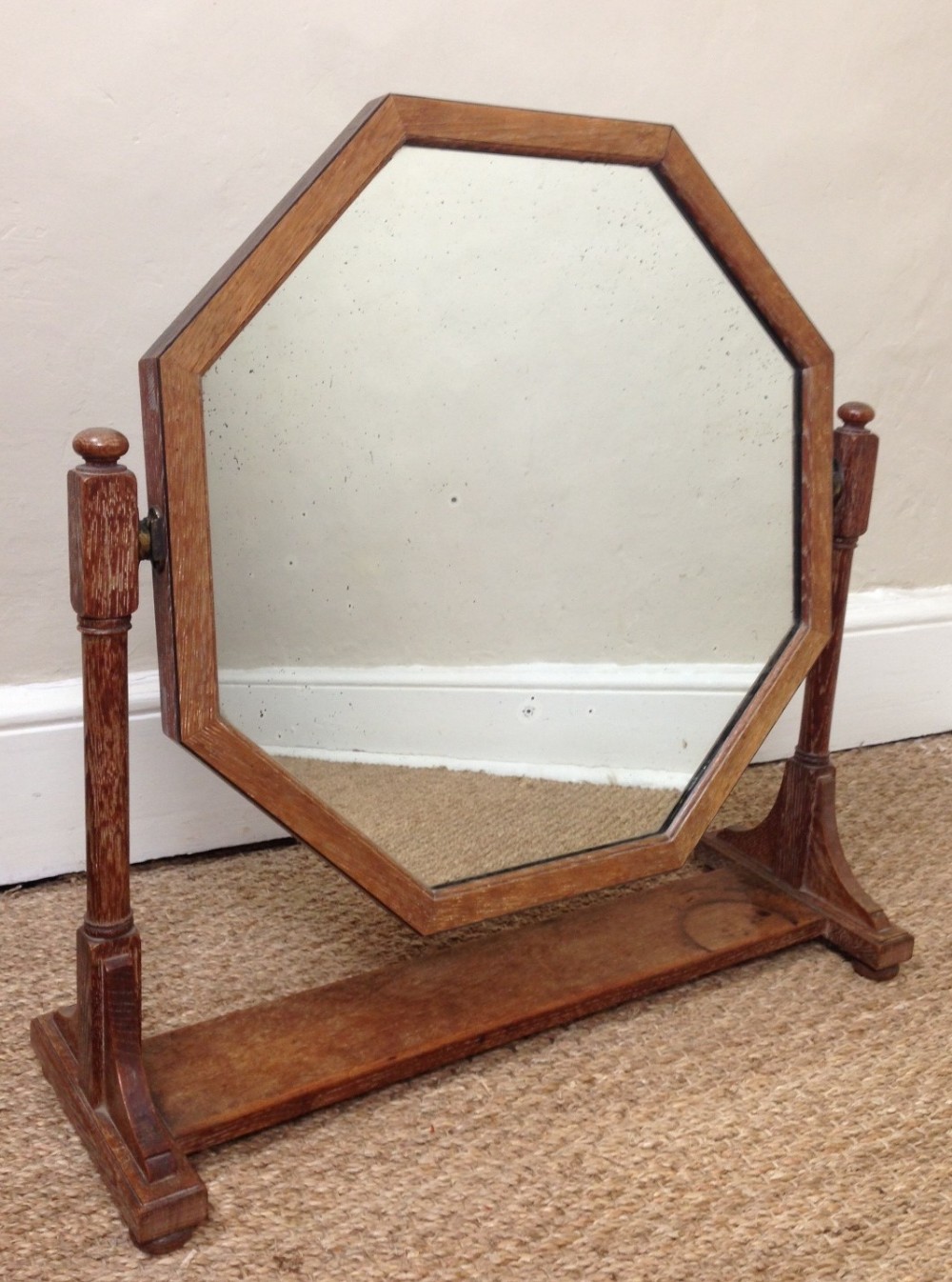 A Heals oak and ebony strung dressing table mirror c 1920