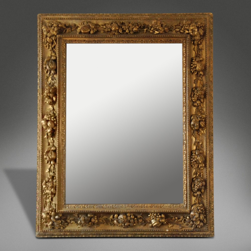 An enormous English Gilt Baroque Style Mirror c 1840