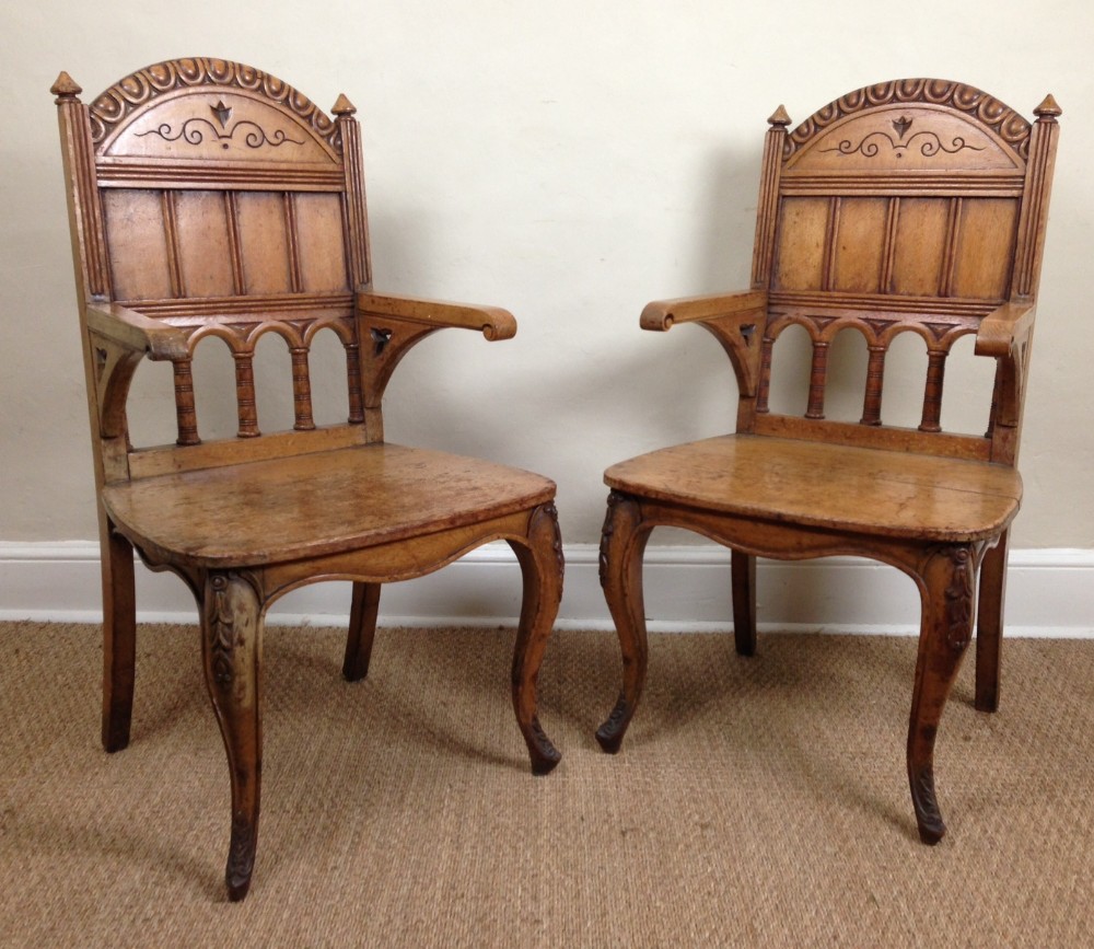 A pair of Victorian honey oak hall chairs c 1865 