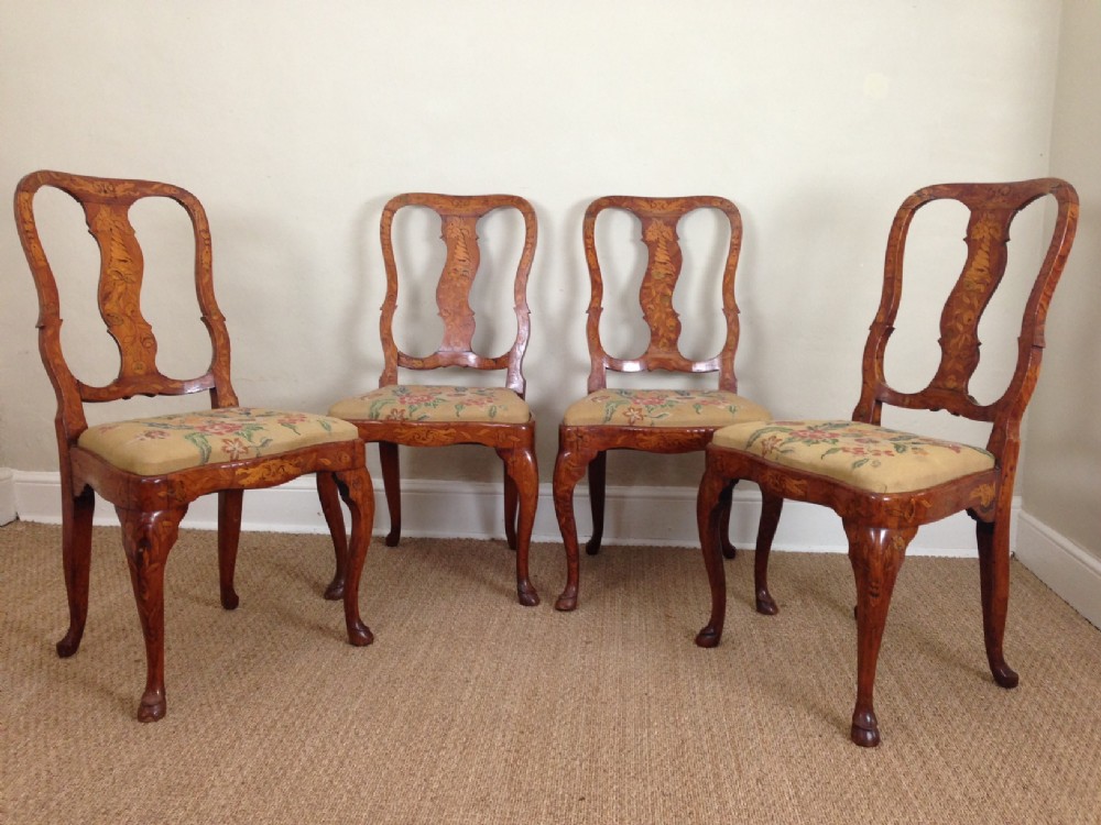 A set of four Dutch marquetry chairs c 1790 