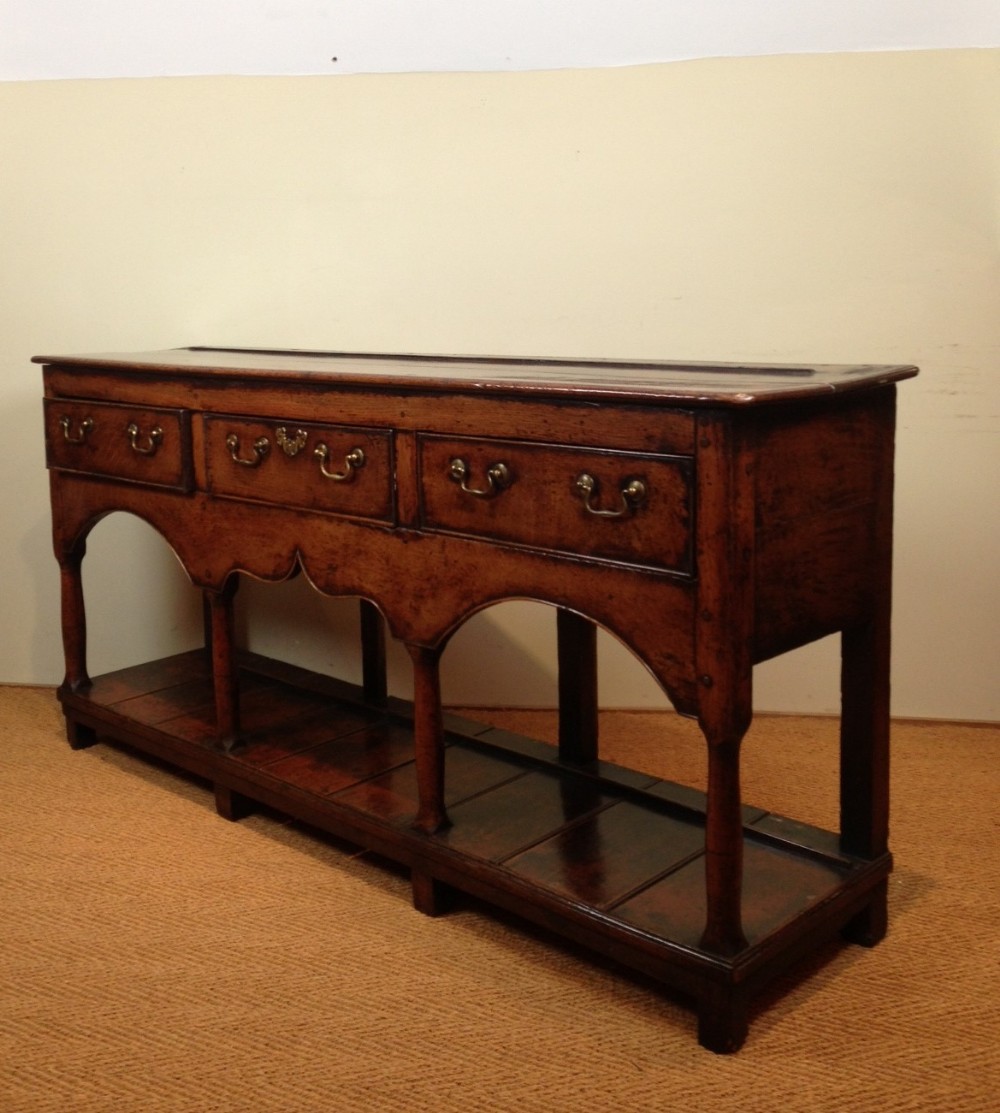 A George 111 South Wales oak potboard dresser c 1780
