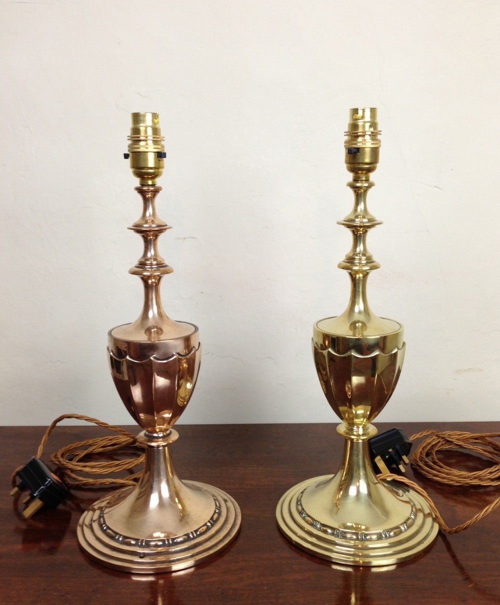 An unusual pair of Edwardian table lamps one in brass the other copper c 1910