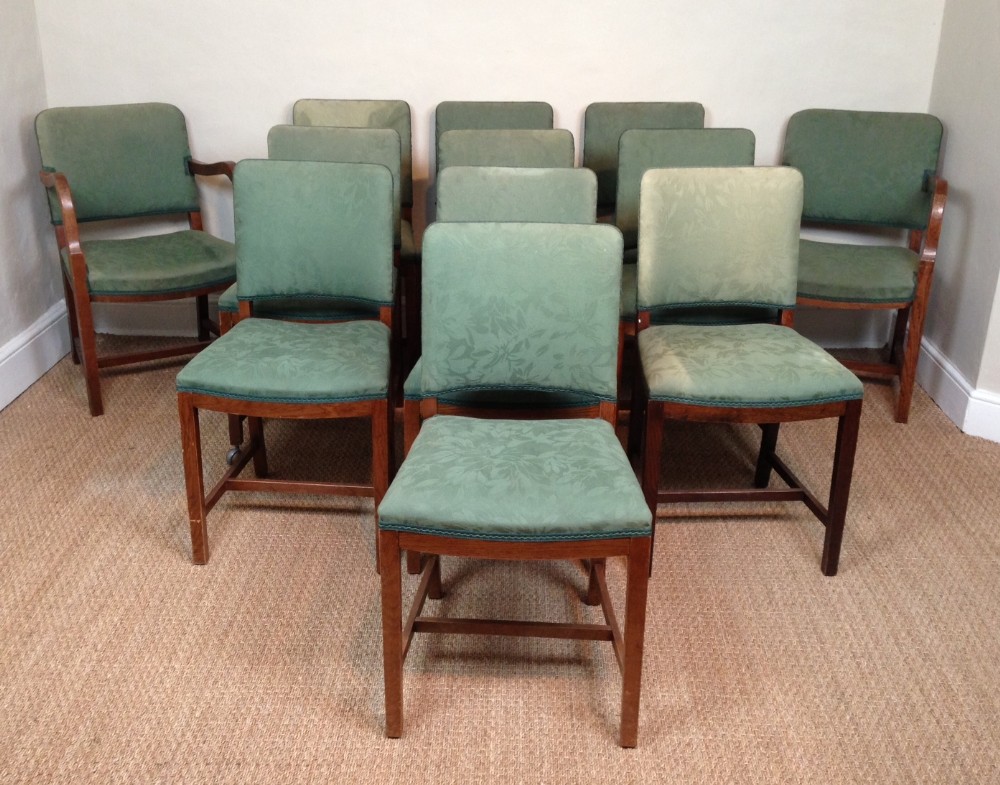 A set of 12 oak dining chairs by Hands of Wycombe c 1930