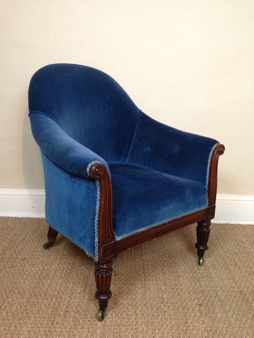 A late Regency mahogany bergere chair c 1830