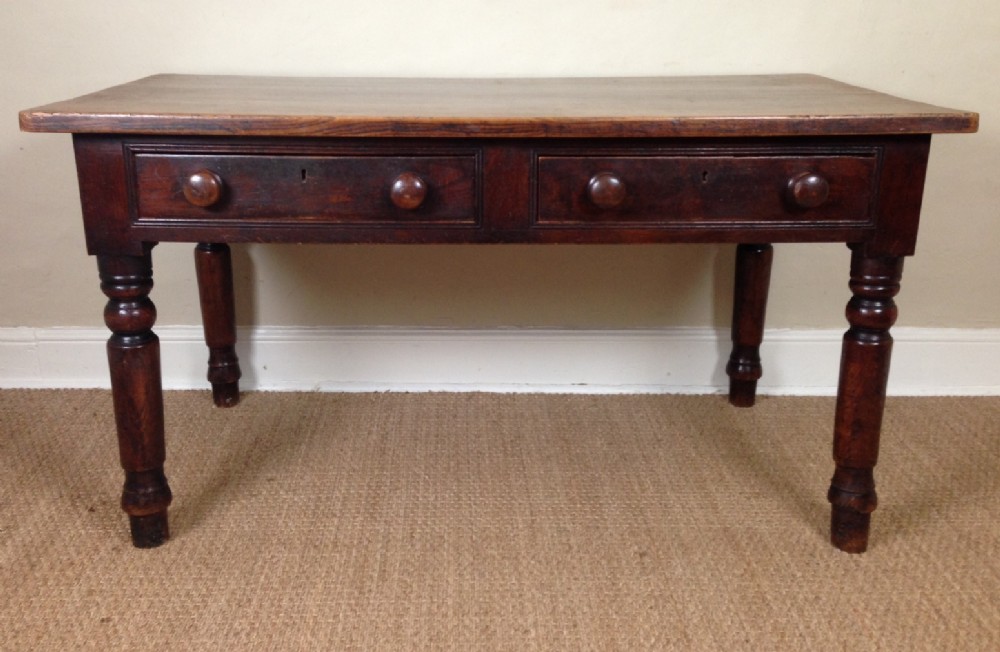 A mid 19th c West Country elm farm table 