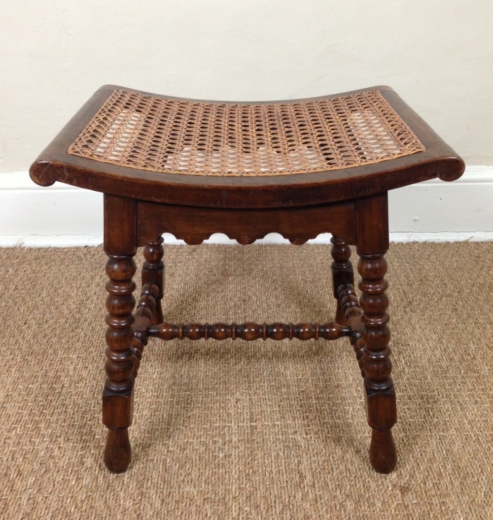 A late 19th c walnut stool c 1900