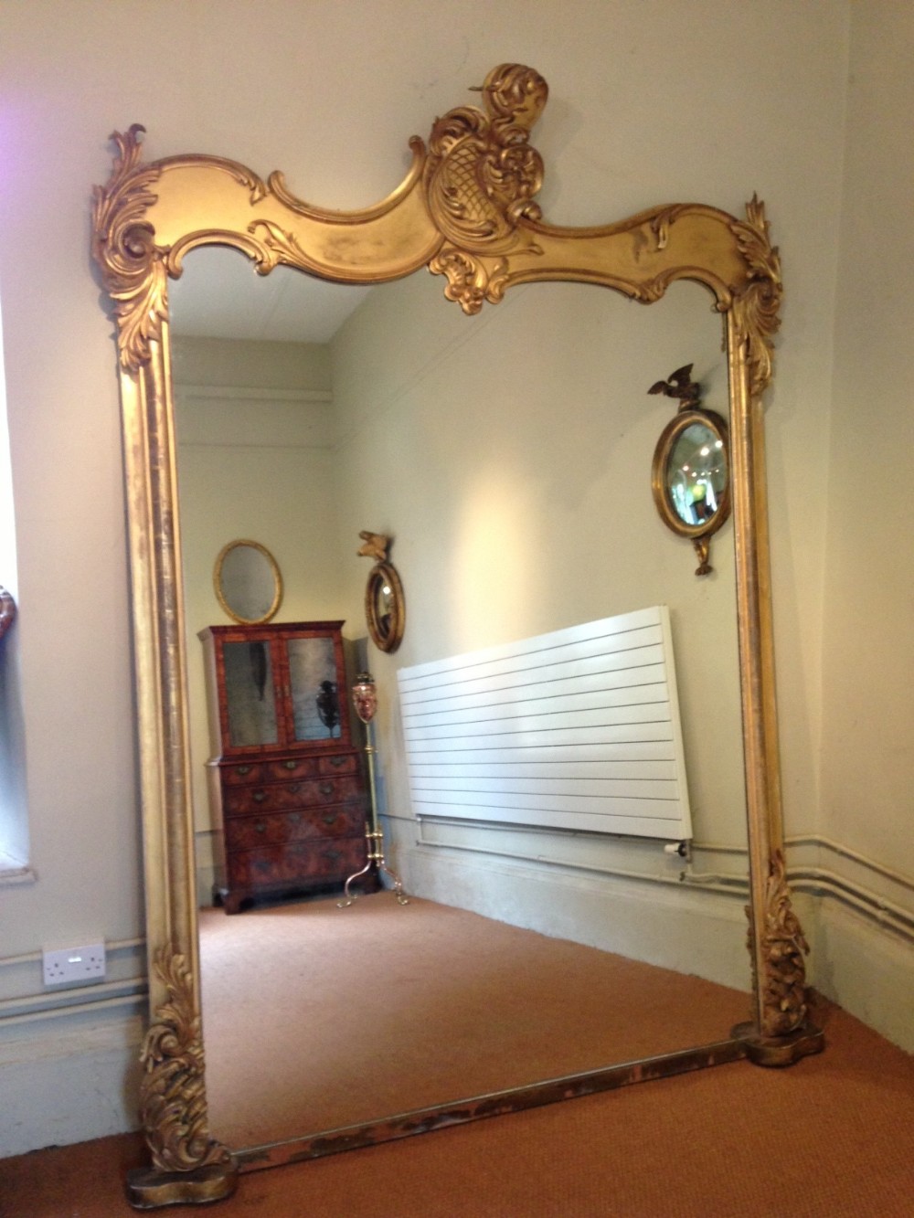 A monumental early Victorian gilt mirror c 1840