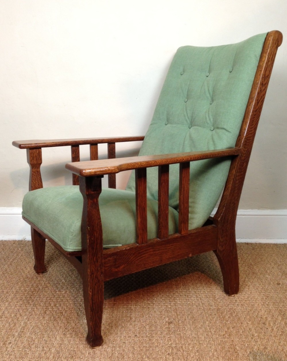 An Arts and Crafts oak armchair c 1900