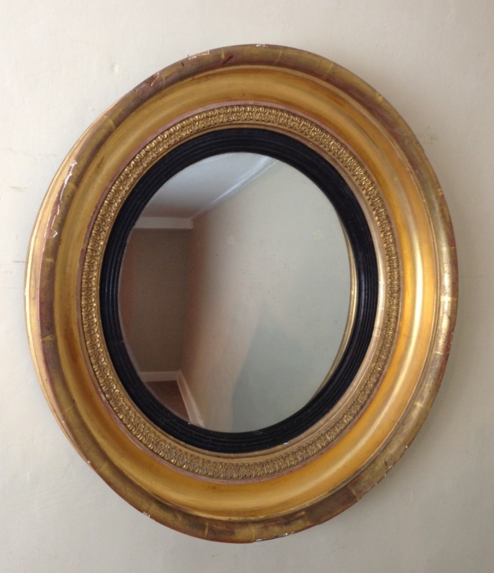 A Regency convex mirror c 1820 of good size