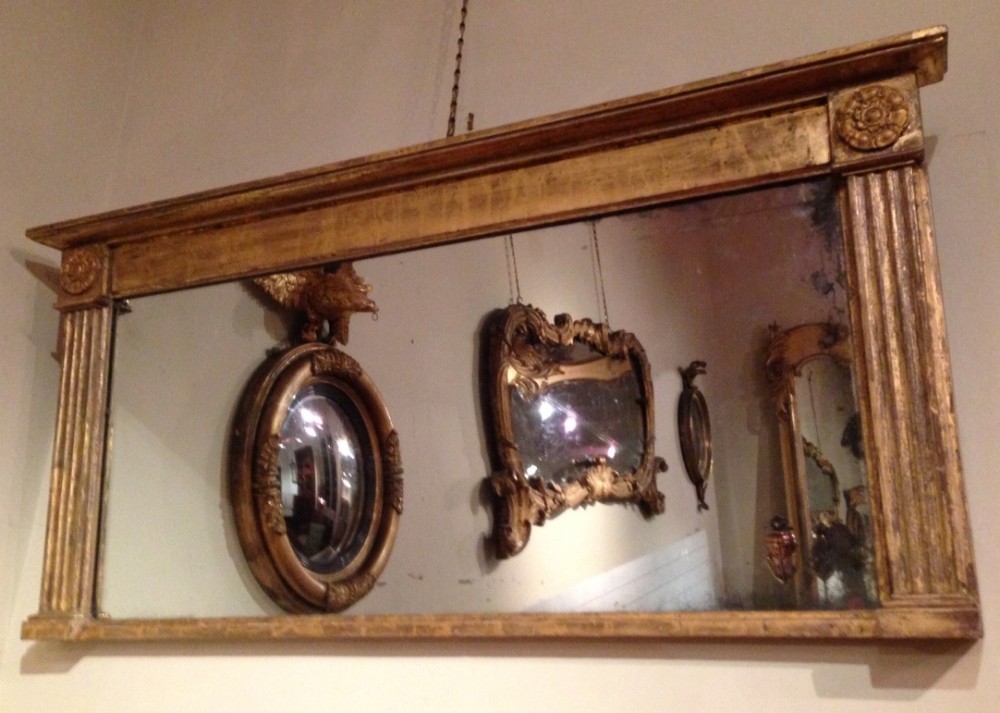 A late Regency gilt overmantel mirror c 1830