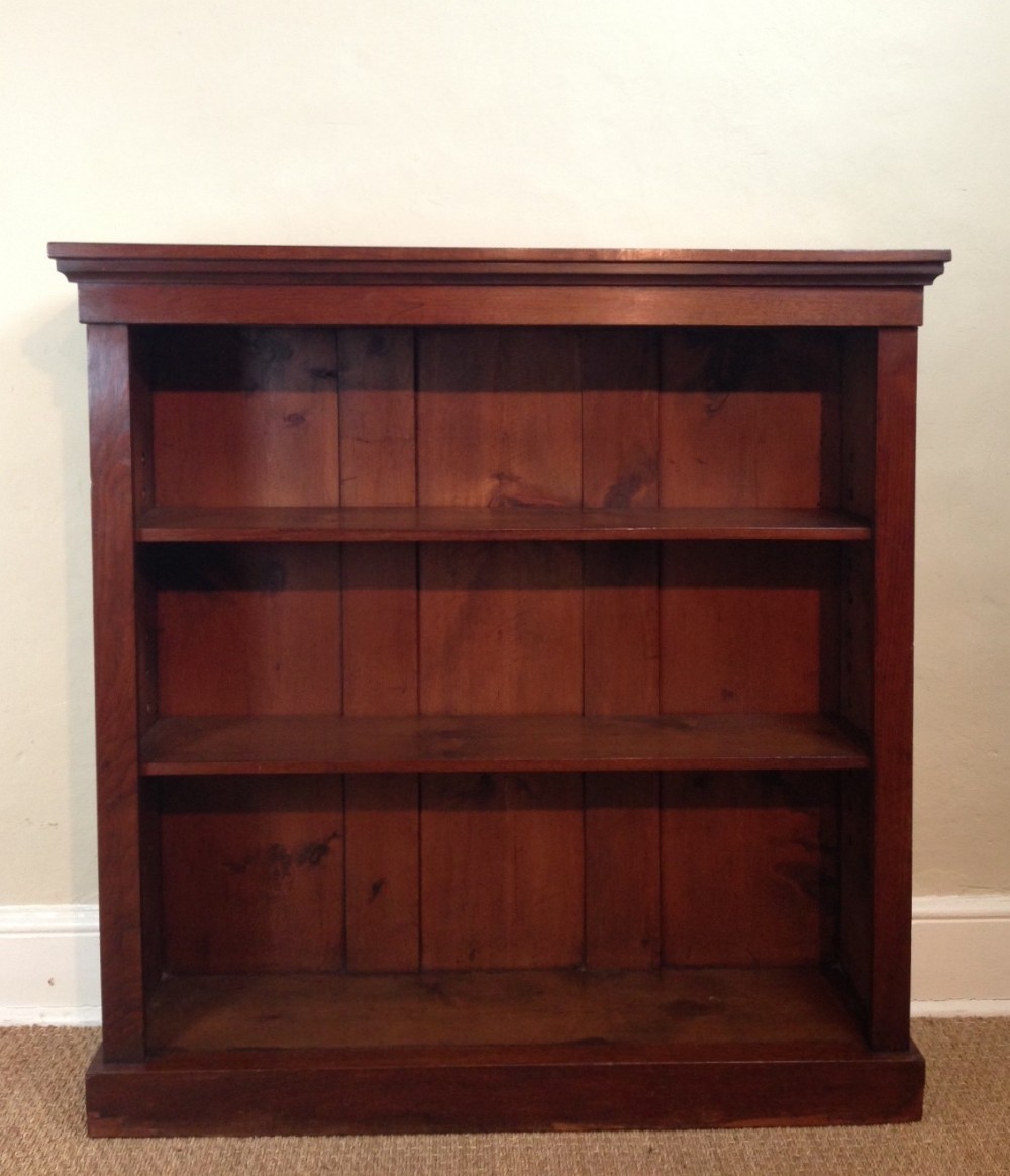 A Victorian walnut open bookcase c 1880