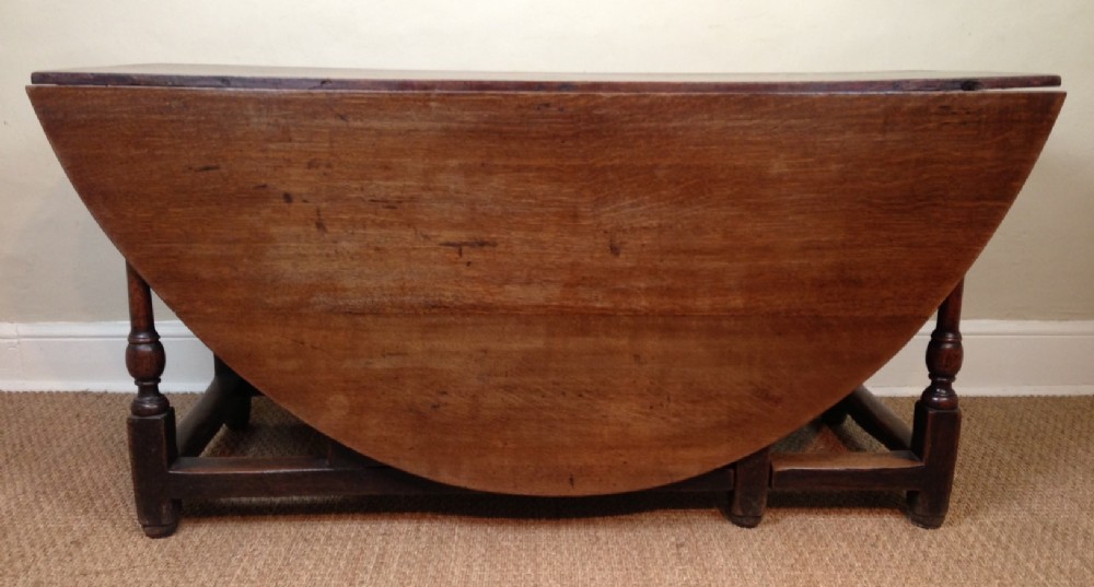 A large Queen Anne oak gateleg table circa 1710