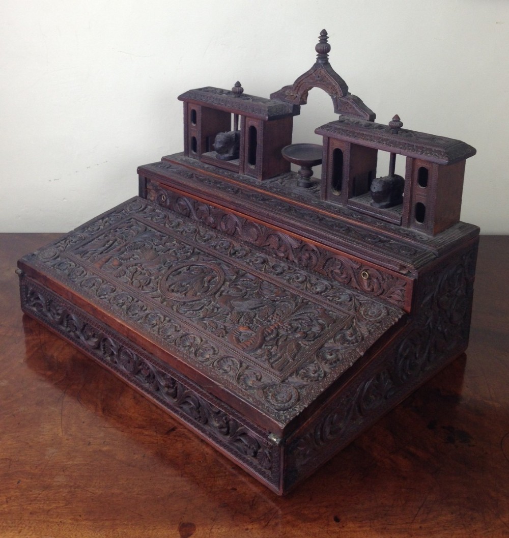 An Anglo Indian carved sandalwood writing box. Coonia c 1880