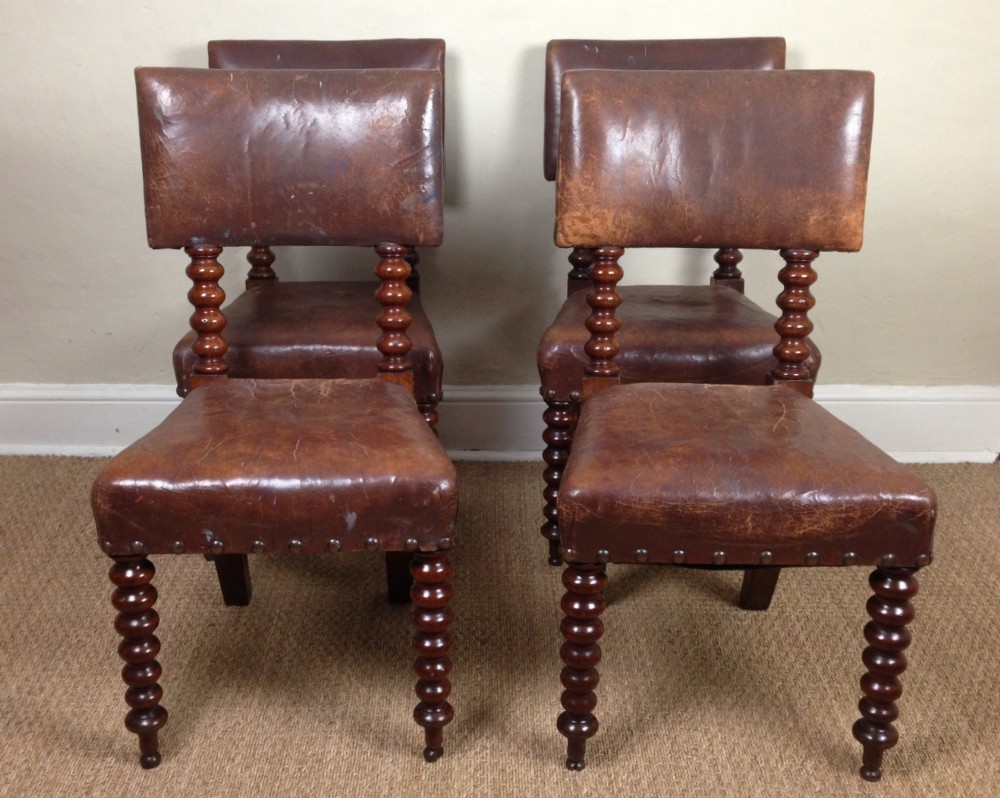 A set of 4 Scottish oak and leather side chairs c 1880