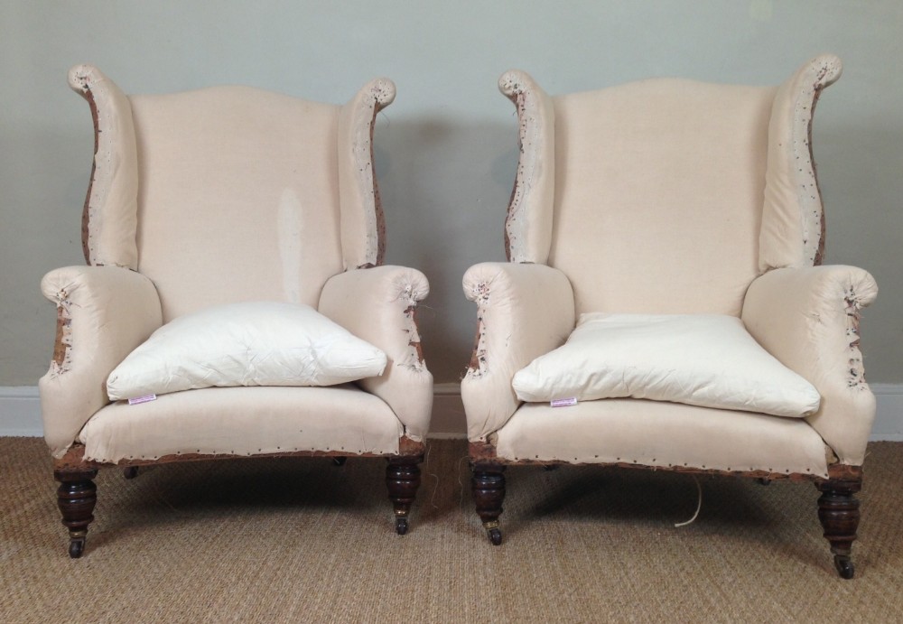 A pair of Victorian wing chairs c 1890