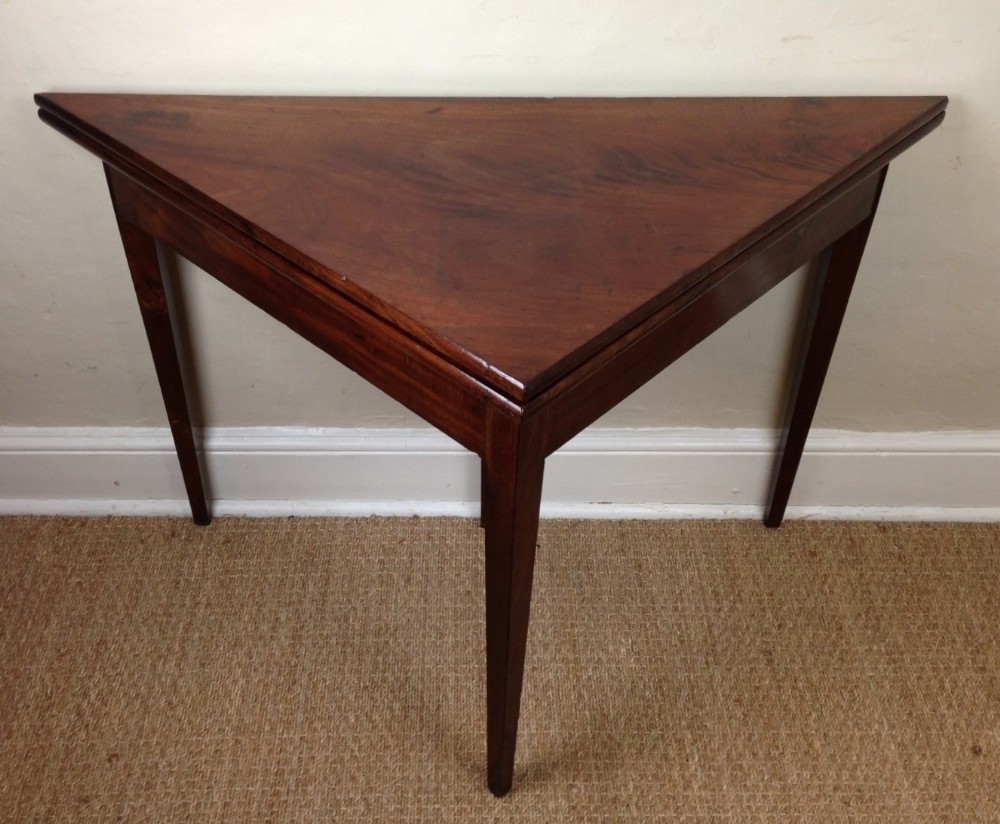 A George 111 mahogany triangular table c 1800