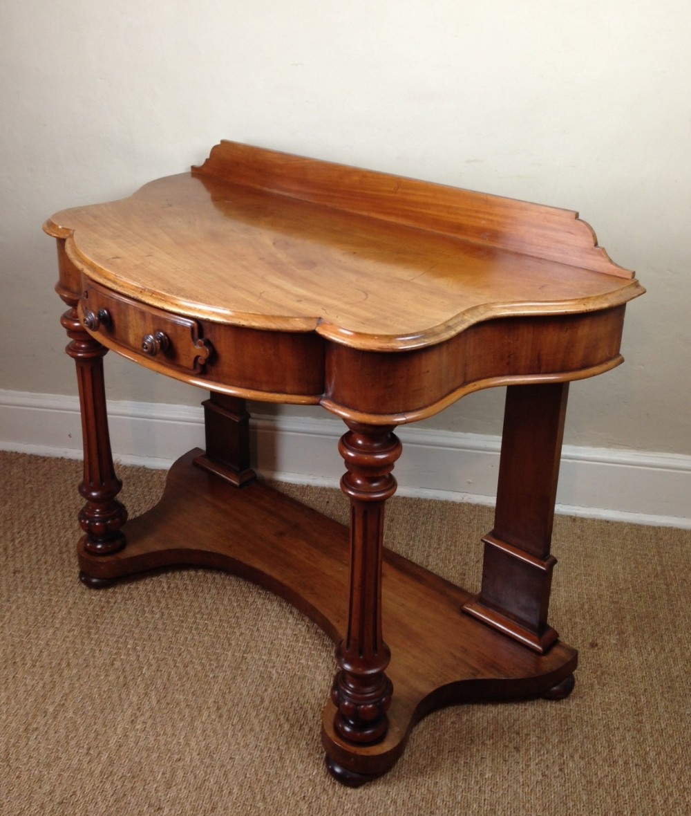 A Victorian mahogany duchesse dressing table c 1880
