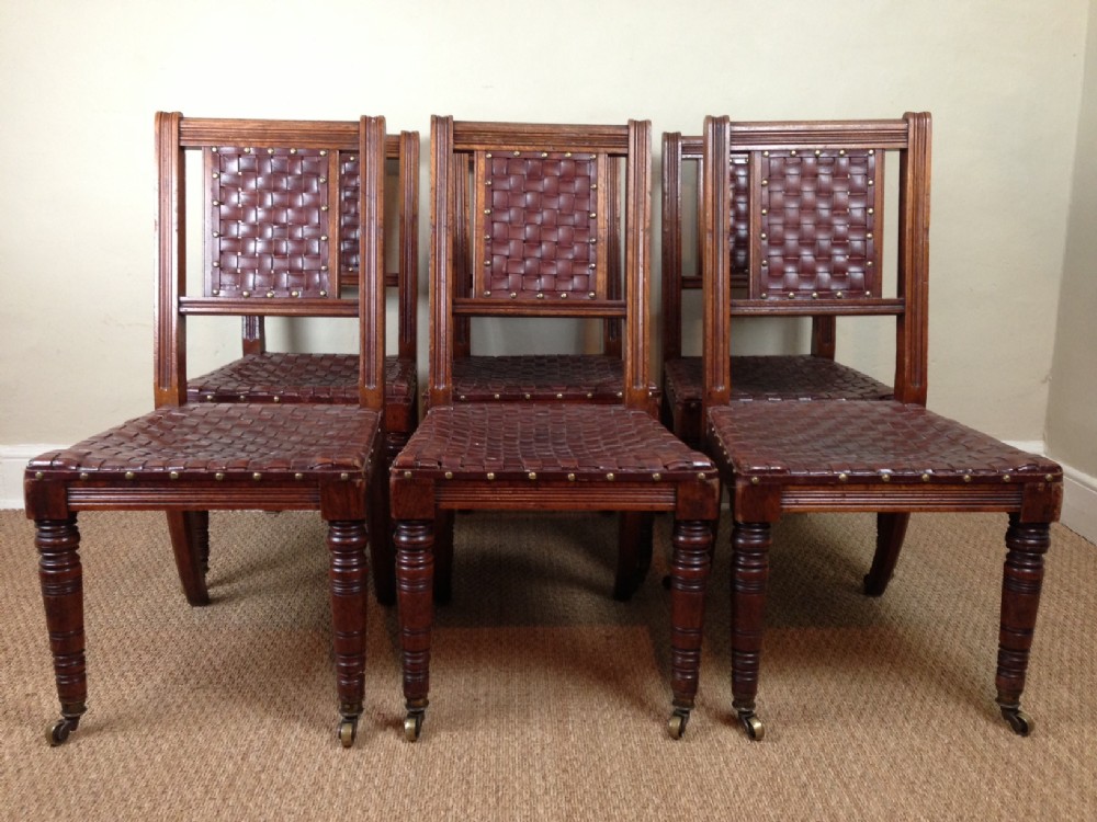 A set of 6 Gillows oak and leather chairs c 1875