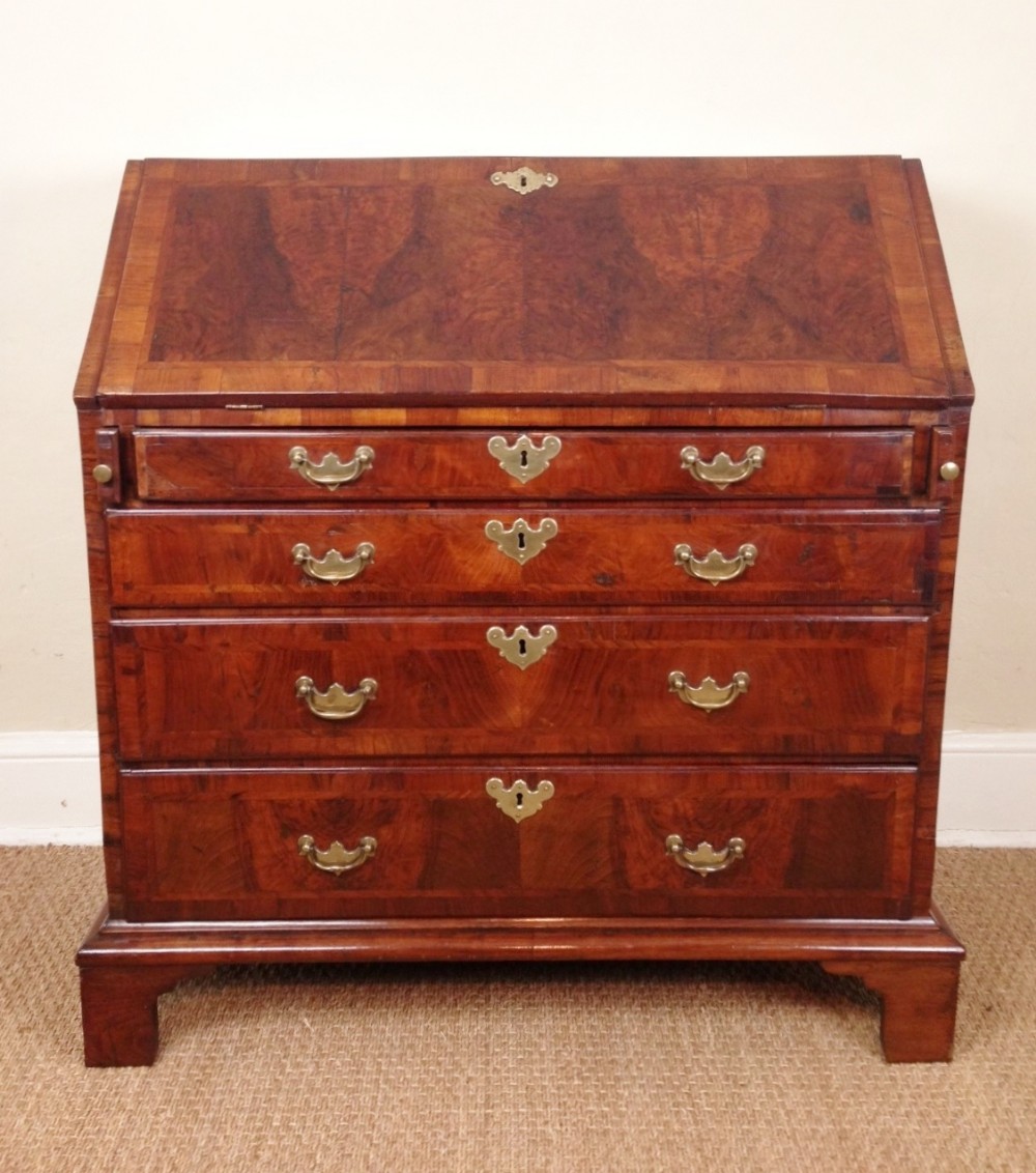 A small George 11 walnut bureau c 1730
