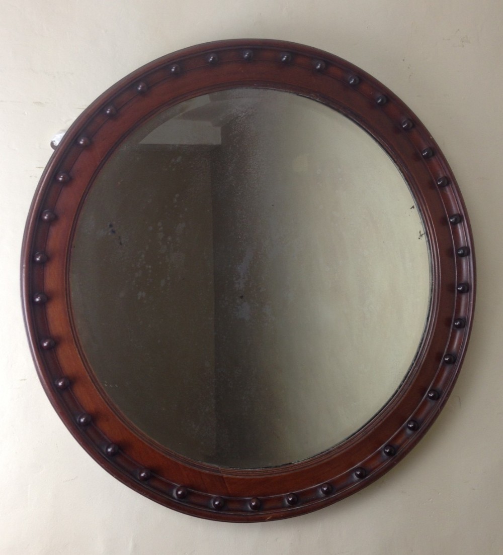 A large Victorian mahogany circular mirror c 1890
