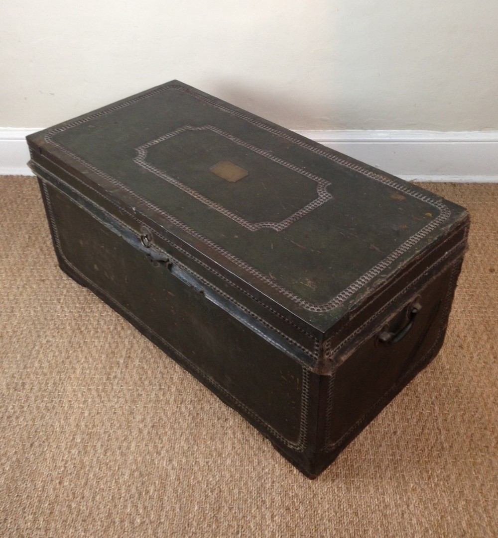 A late Georgian leather brass and camphor carriage trunk c 1820