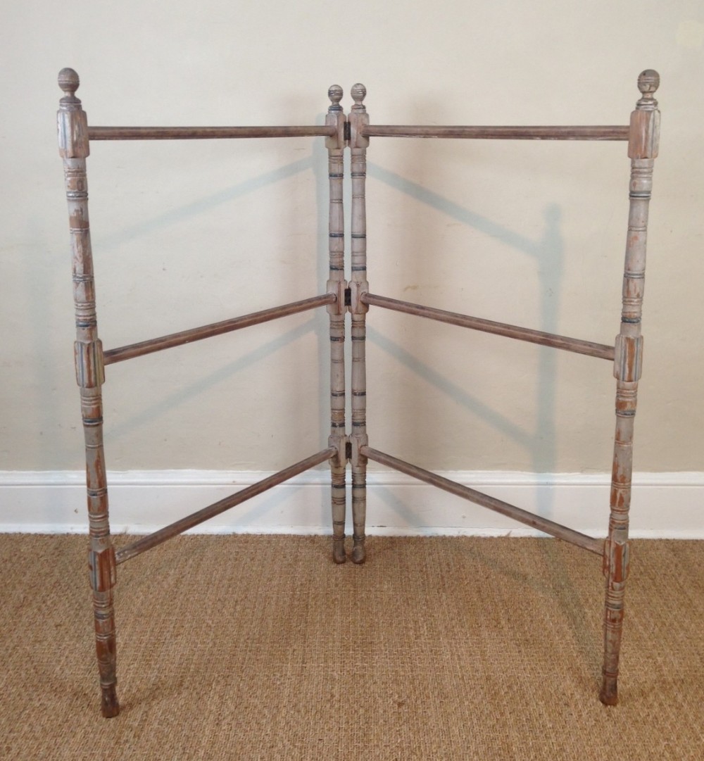 An early 19th century country house painted towel rail