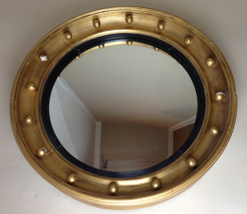 A Regency gilt convex mirror c 1820