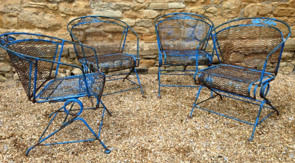 A set of 4 blue painted 1930's French garden chairs