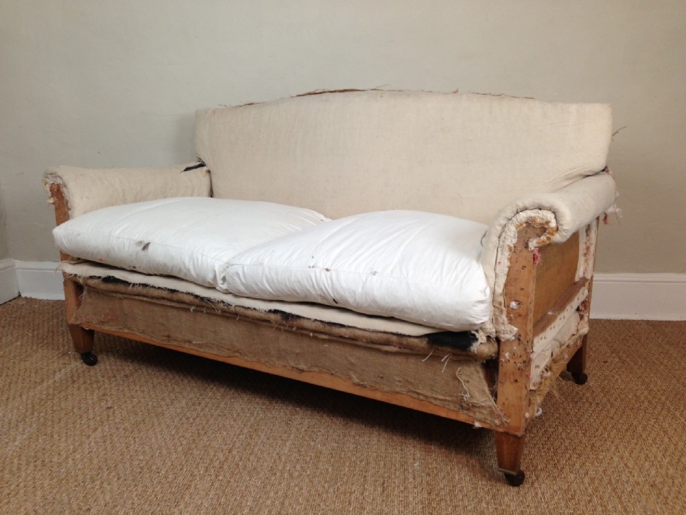 An Edwardian 2 seater Howard style sofa c 1910 for recovering