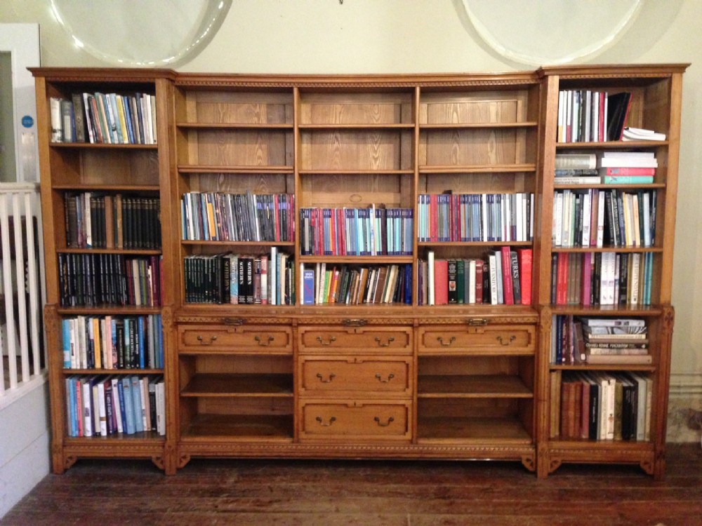 An impressive Gothic Reform oak open bookcase c 1875 