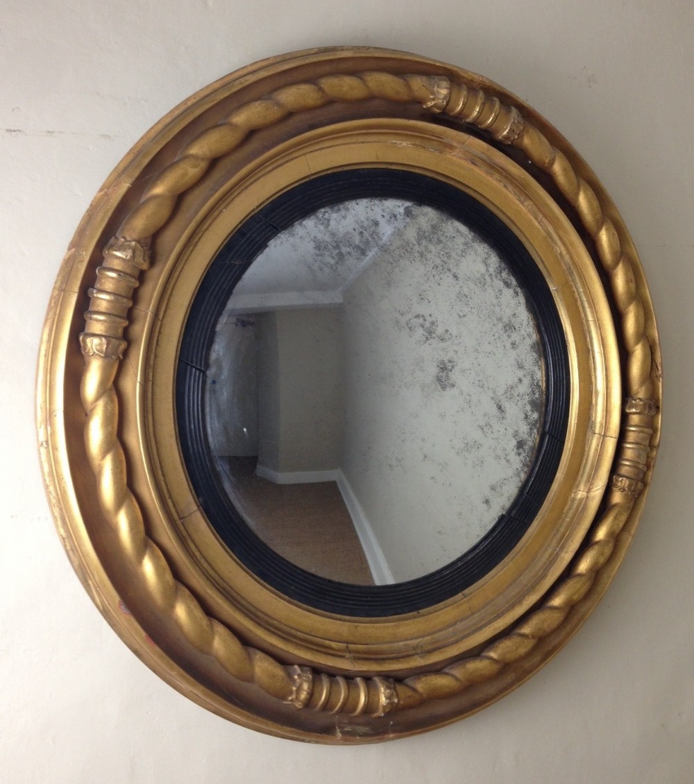 A large Regency convex mirror c 1820
