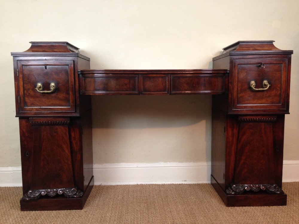 A small Regency mahogany pedestal sideboard c 1820