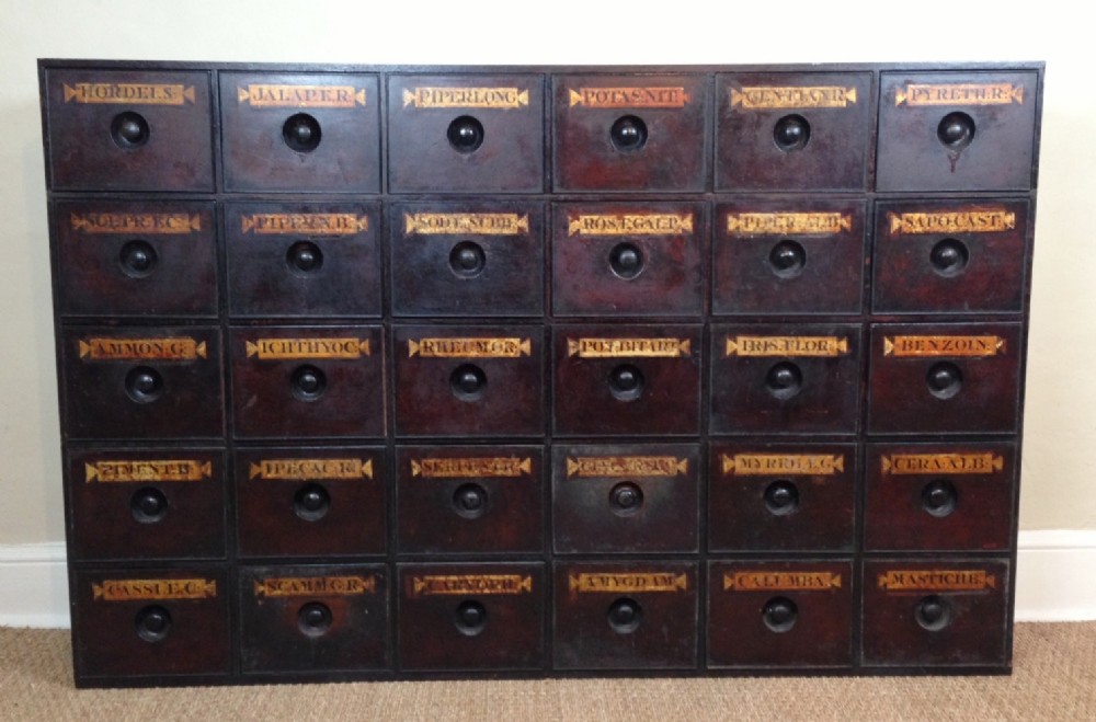 A large mid 19th c bank of Apothecary drawers c 1840