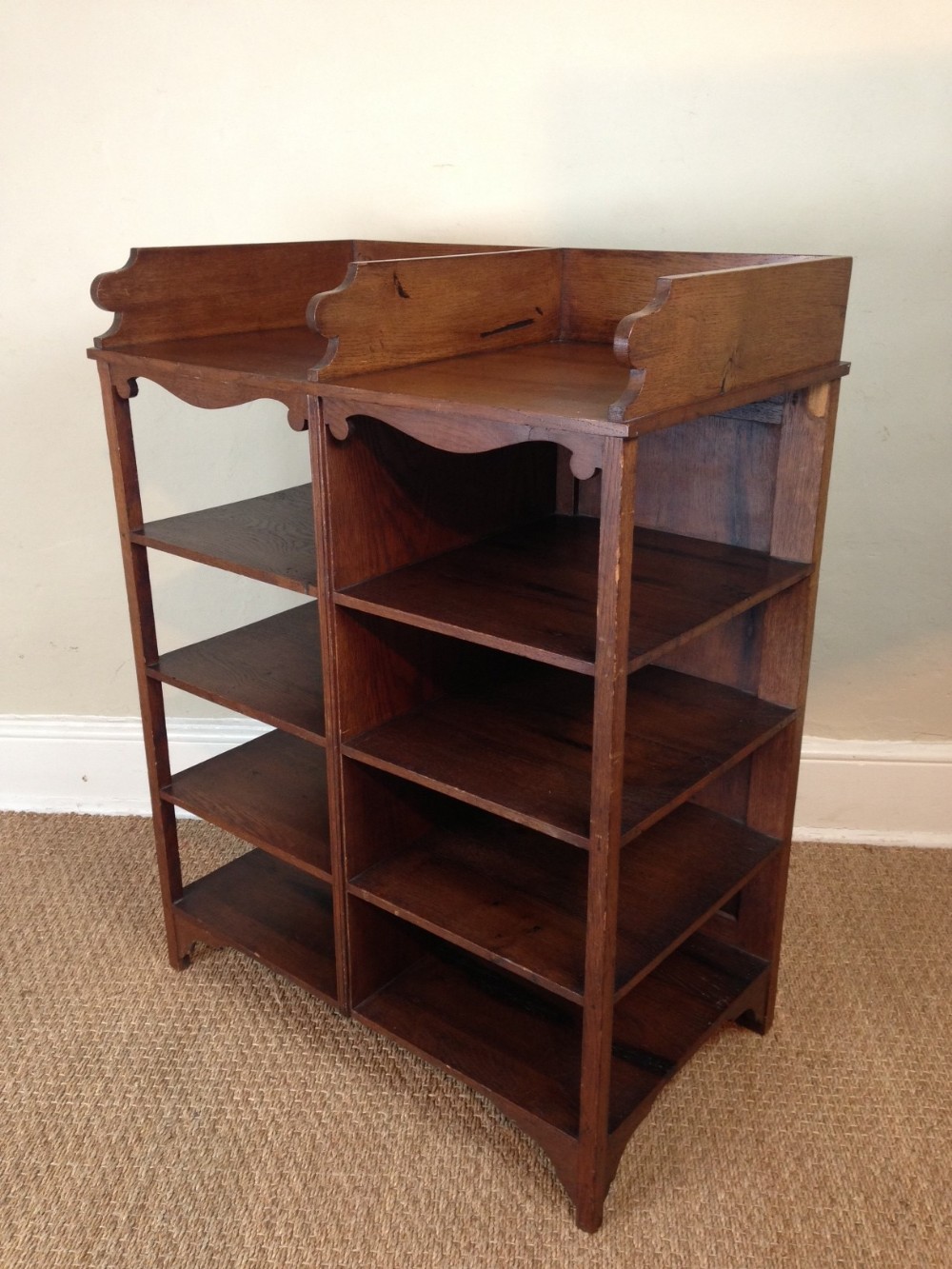 An Edwardian oak book cabinet c 1910