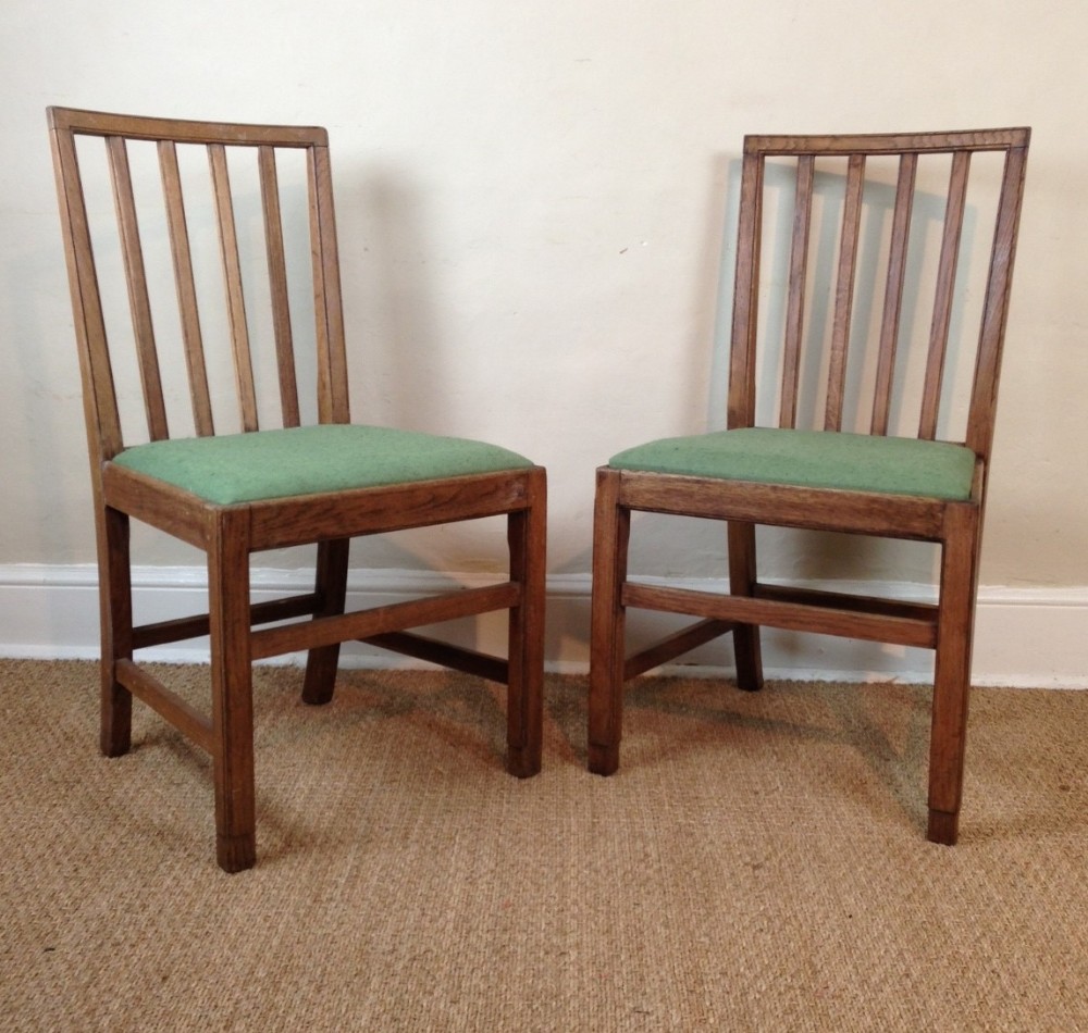 A Set of 8 Gordon Russell oak dining chairs c 1935