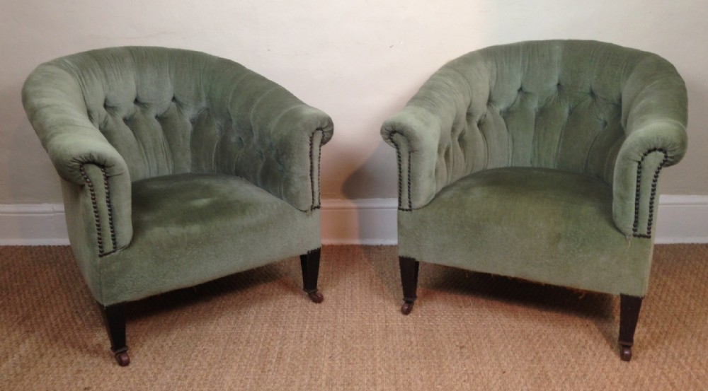 A pair of Edwardian mahogany tub chairs c 1910