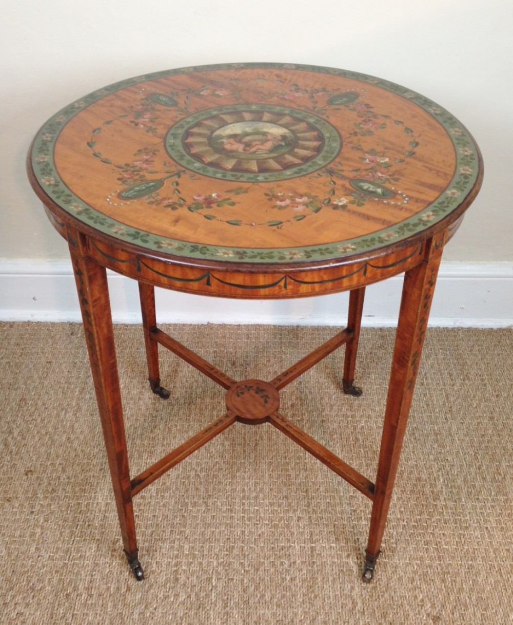 An early Victorian satinwood and painted centre table c 1860