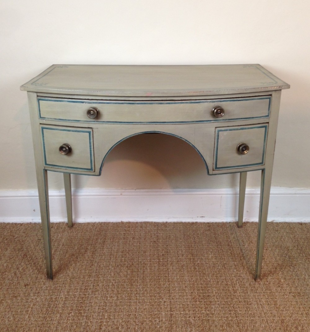 A Regency painted bow front dressing table c 1820