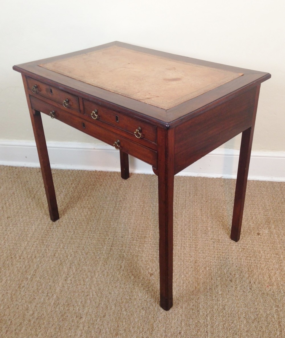 An early George 111 mahogany writing table c 1770