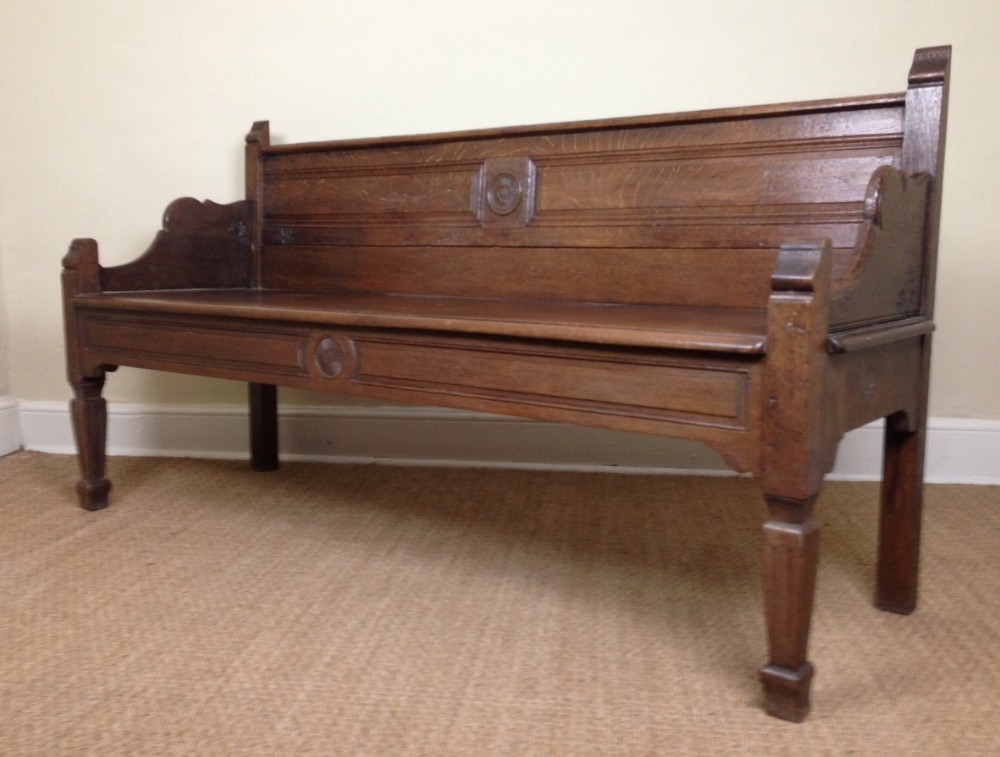 An Aesthetic Movement oak hall bench. Irish c 1880