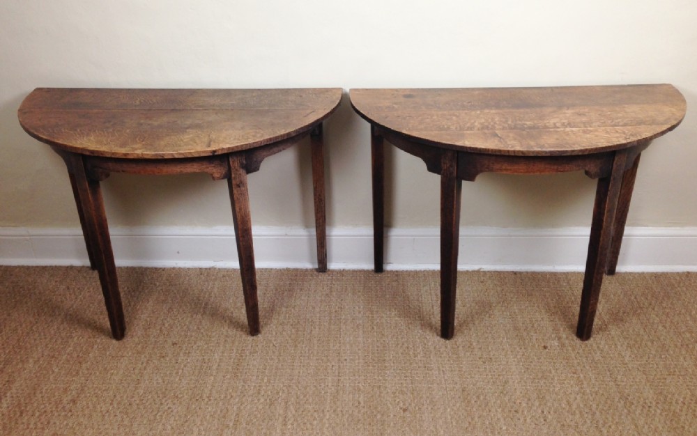 A pair of George 111 oak D end tables c 1800