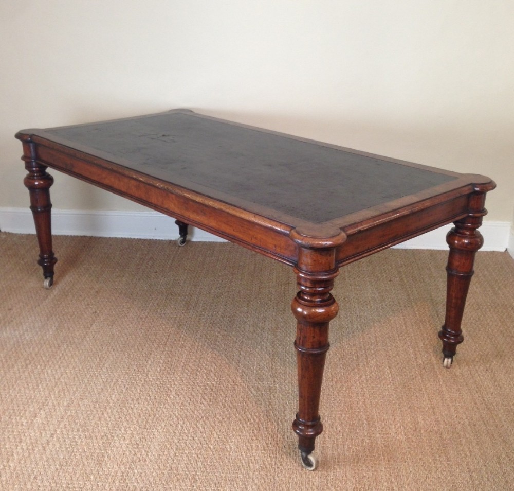 A Victorian burr oak partners writing table c 1880