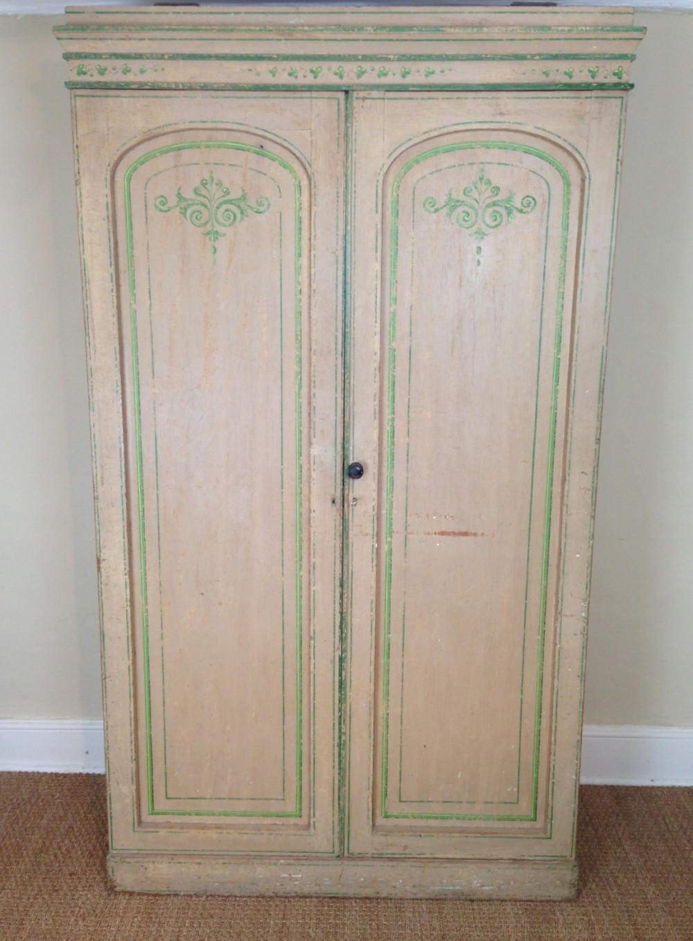 A mid 19th c painted wardrobe c 1840 with original decoration